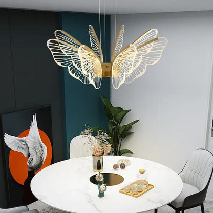 Gold-toned decorbites butterfly modern pendant light with intricate wireframe wings for dining room decor