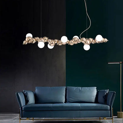 Modern gold decorbites caterpillar metal ball pendant light fixture with white spheres for dining room lighting