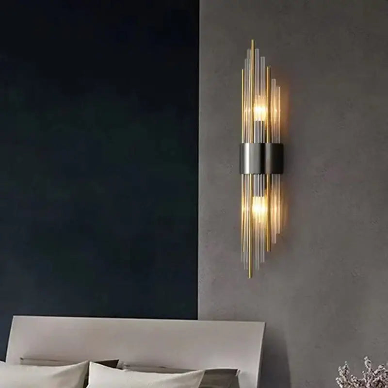 Modern gold decorbites clear crystal led wall lamp with slender transparent glass rods and brushed metal band emitting warm light