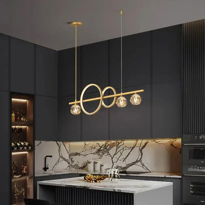 Modern gold decorbites crystal chandelier pendant light with intersecting rings and crystal globe bulbs for dining room