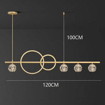 Modern gold decorbites crystal chandelier pendant light with intersecting rings and four crystal globe shades for dining room