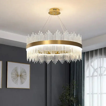 Modern gold decorbites crystal chandelier featuring clear glass rods in a cascading design for living room use