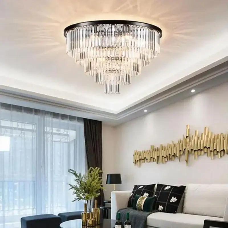Modern gold decorbites crystal flush ceiling light with black frame and cascading clear crystal prisms for bedroom