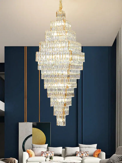 A modern decorbites crystal large chandelier with gold-toned accents hangs elegantly for staircase lighting