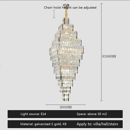 A tall decorbites crystal large chandelier with gold metal frame and multiple rows of clear rectangular crystals