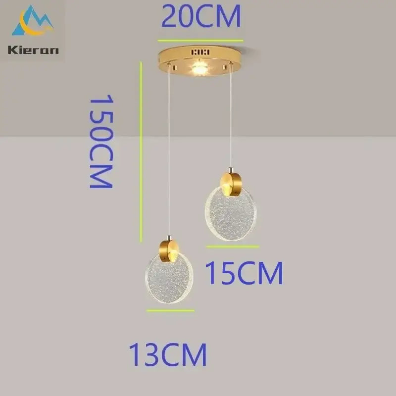 Modern gold decorbites crystal led chandelier featuring two textured clear glass orbs suspended by thin cords