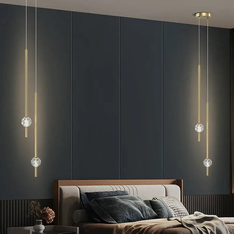 Modern gold decorbites crystal led chandelier features gold-toned pendant lights with crystal spheres for bedroom decor