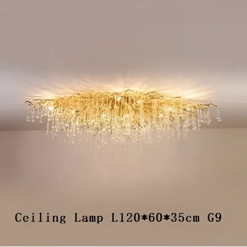 Modern gold decorbites crystal led chandelier with branching design and dangling clear crystals for dining room light