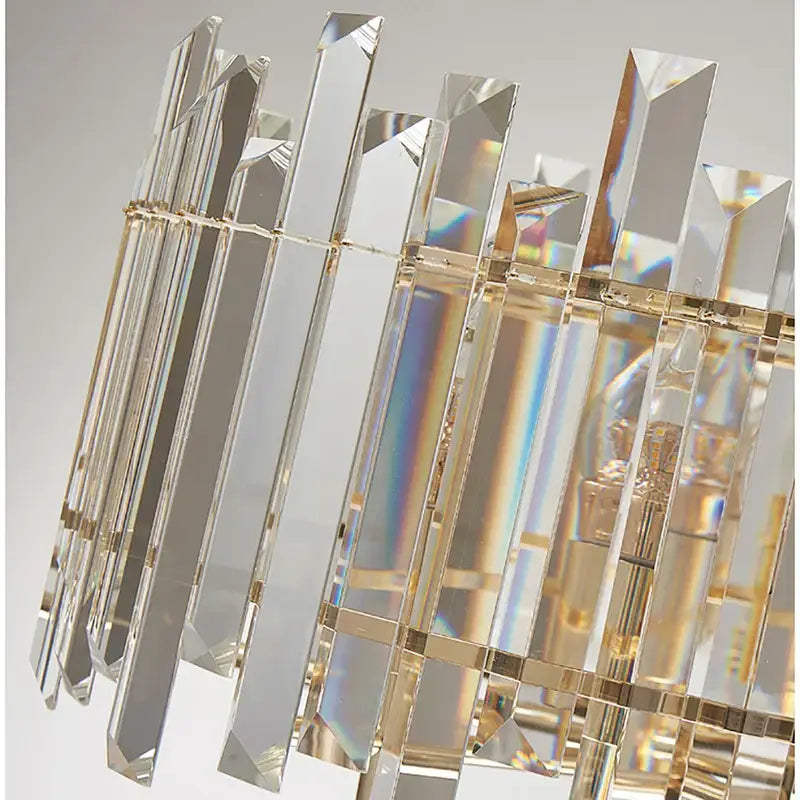 Modern gold decorbites crystal round chandelier with tall faceted crystal prisms and gold metal frame for living room light