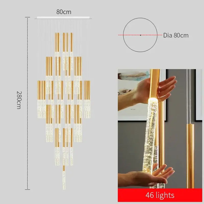Modern gold decorbites crystal staircase chandelier with cascading cylindrical crystals and 46 embedded lights for living room
