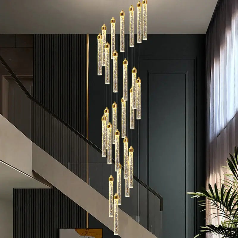 Modern gold decorbites deluxe crystal chandelier with golden tips and cascading glass tubes for dining room lighting