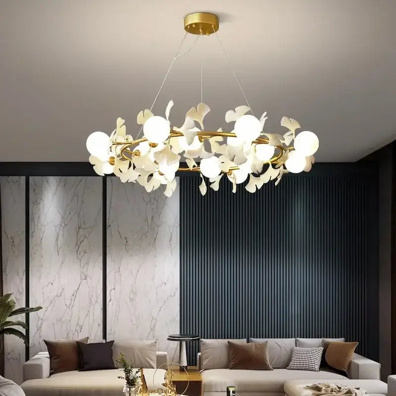 Modern gold decorbites gingko leaf branch chandelier with white petal-shaped glass orbs for living room lighting
