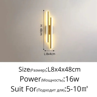 Modern gold decorbites led strip wall lamp with two vertical bars and central accent emitting warm bedroom light