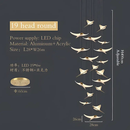 A modern gold dolphin pendant chandelier with 19 adjustable aluminum and acrylic bird-shaped lights for hotel lobbies