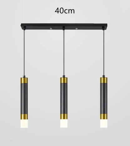 Modern gold double head led pendant lights in black and gold with cylindrical design suspended from 40cm bar