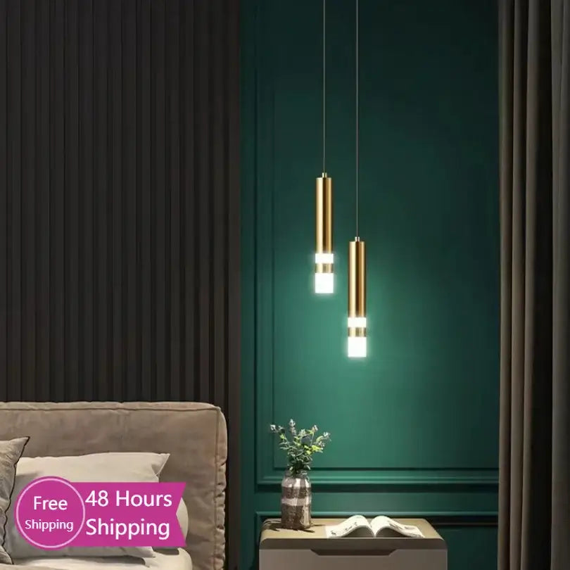 Modern gold double head led pendant lights with illuminated white bands hang from ceiling for bedroom lighting