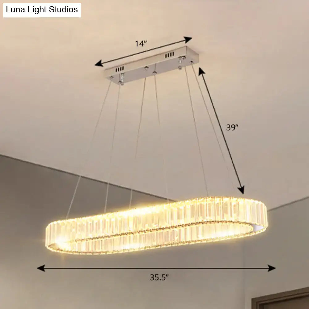 Decorbites™ sleek led suspension lamp with optical k9 crystal rings in chrome emitting warm golden glow