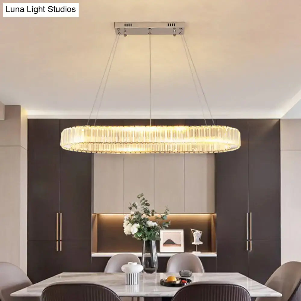 Modern circular led suspension lamp by decorbites with optical k9 crystal rods emitting warm golden light for restaurants and islands