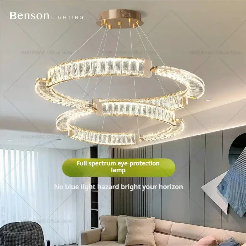 Modern gold double ring luxury crystal chandelier by benson lighting featuring crystal accents for dining room decorbites light luxury