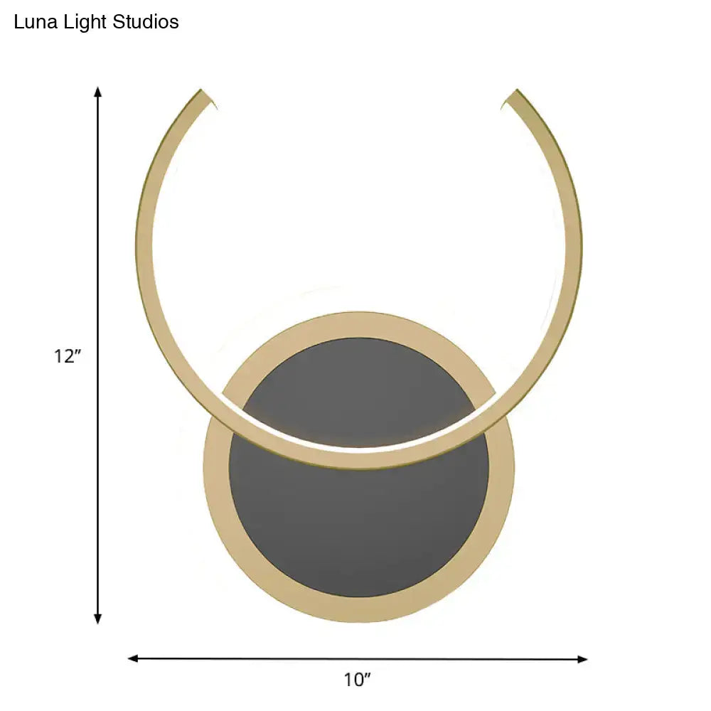 Modern gold dual ring led wall sconce with sleek gold metal frame and two circular glass shades for bedroom lighting