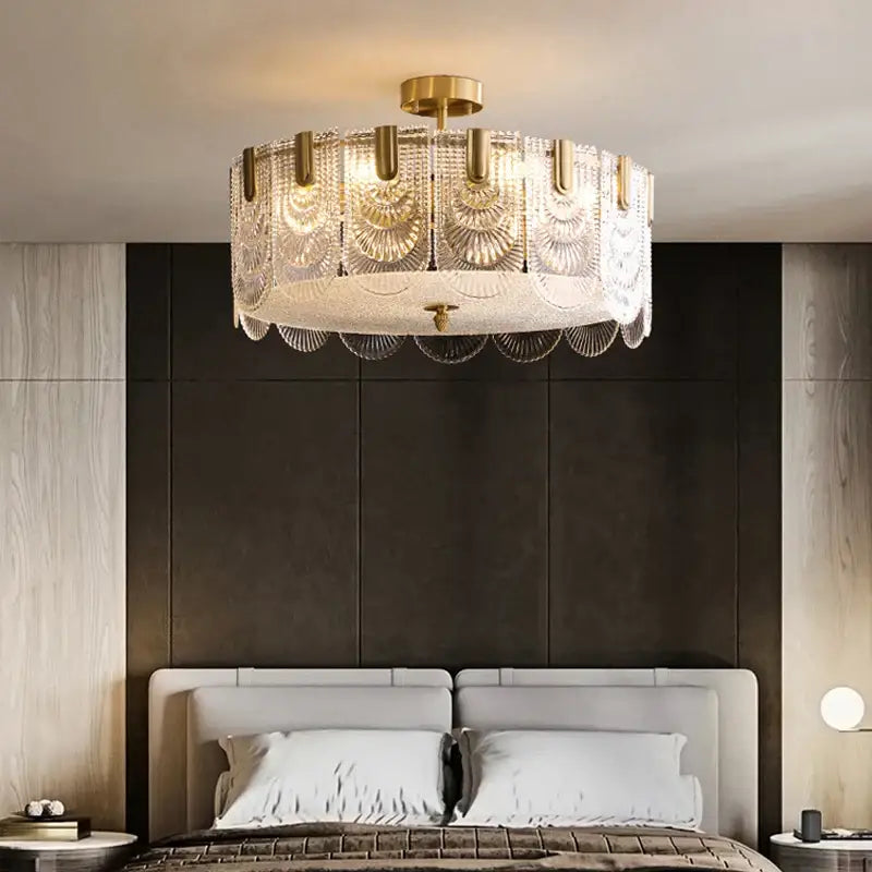 Modern gold elegant crystal chandelier featuring fan glass tiers with gold-toned metal accents by decorbites elegant crystal