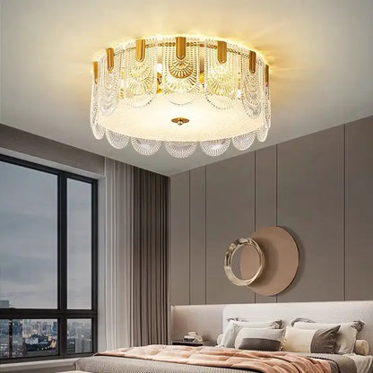 Modern gold elegant crystal chandelier with intricate fan-shaped crystal tiers and frosted glass diffuser by decorbites elegant crystal