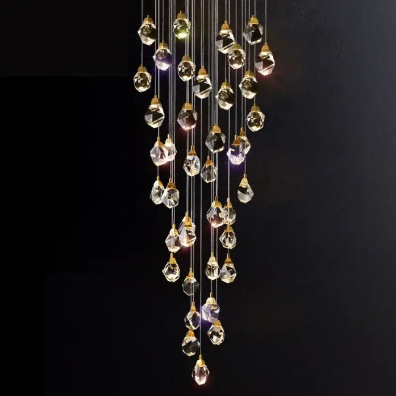 Modern gold elegant crystal chandelier with faceted droplets and gold-toned fixtures for decorbites elegant crystal decor