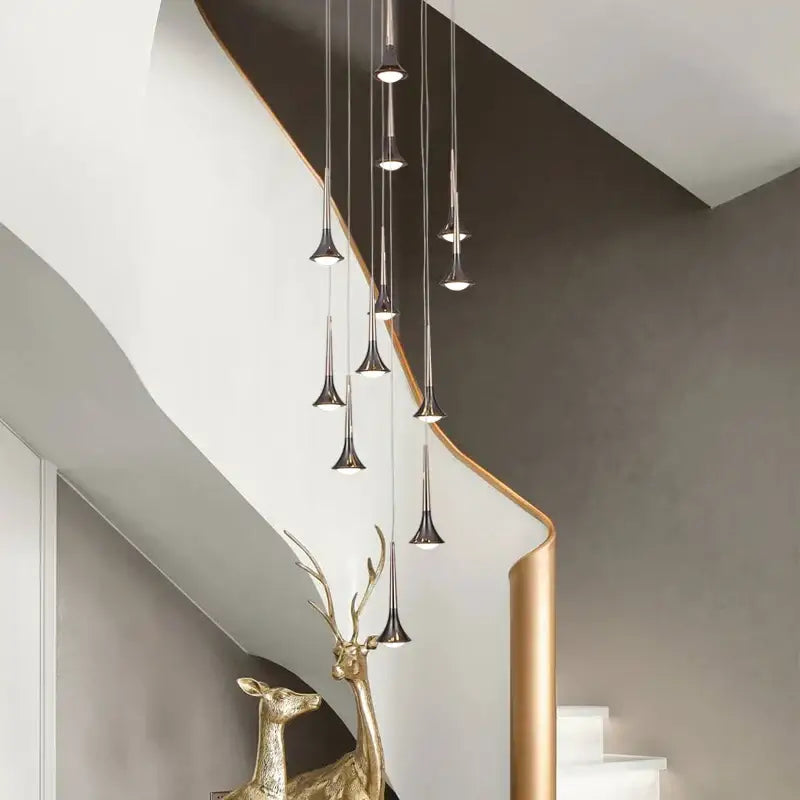 Modern gold elegant horn-shaped chandelier with metallic pendant lights cascading for staircase living room decorbites elegant