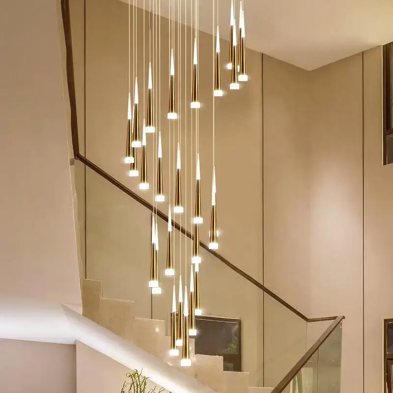 Modern gold elegant led ring chandelier featuring slender tapered pendant lights in a cascading arrangement for living room decorbites elegant led