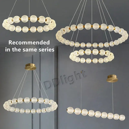 Modern gold elegant pearl necklace chandelier with frosted glass spheres and gold-toned metal decorbites elegant pearl design