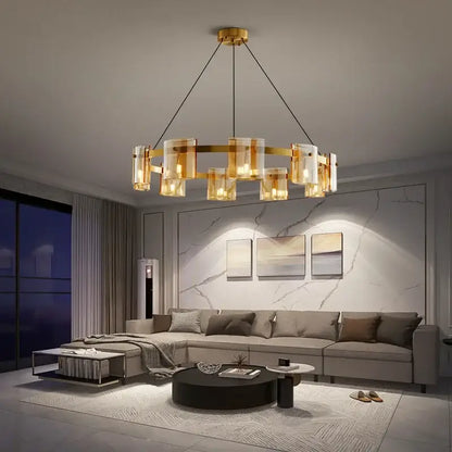 Modern gold elegant smoky glass chandelier with clear glass cylinders and warm glowing lights for dining room decorbites elegant smoky
