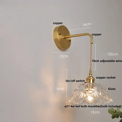 Antique brass-finished copper wall light with faceted clear glass decorbites clear glass shade and adjustable wire