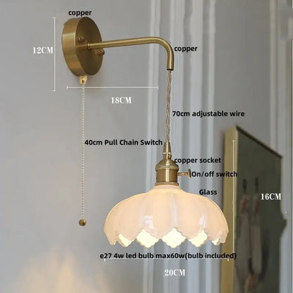 Modern gold faceted clear glass wall light with antique brass finish petal-shaped frosted shade and adjustable copper wire decorbites clear glass