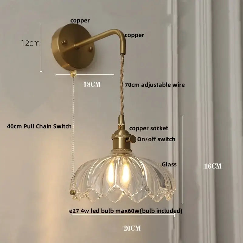 Copper-finished wall light with clear glass petal-shaped shade and adjustable wire for modern bedroom decorbites clear glass