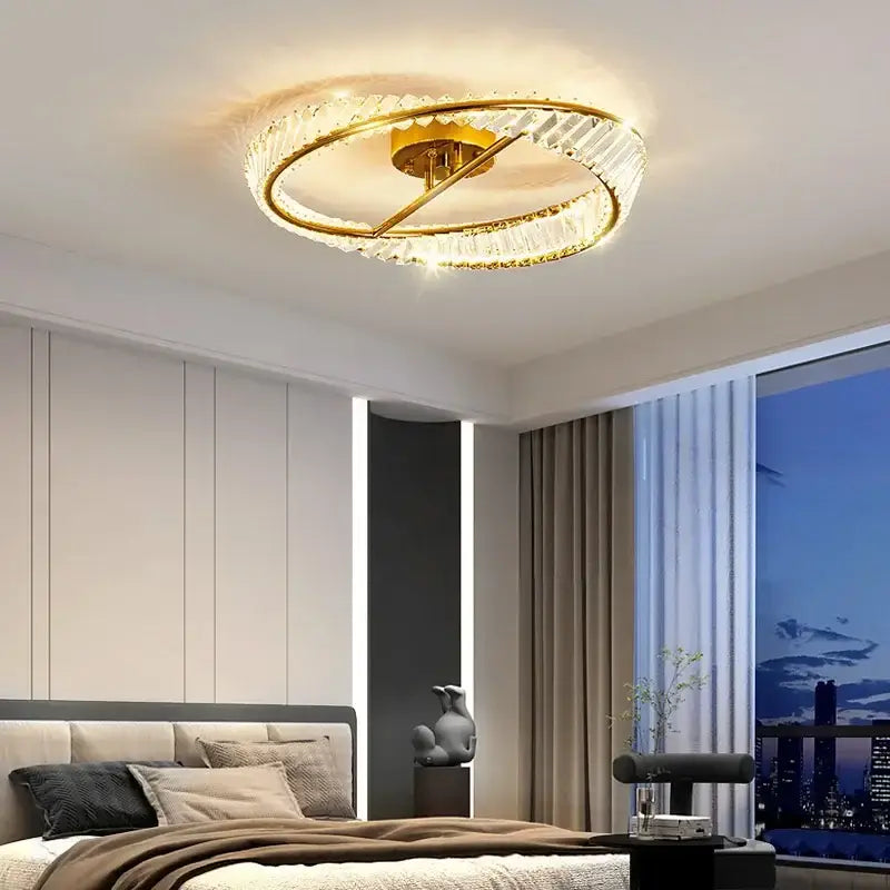 Modern gold faceted crystal rings led ceiling light with gold-toned circular design and decorbites crystal rings accents