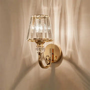 Modern gold wall lamp with faceted glass shade and decorative crystal accents for living room wall lamp