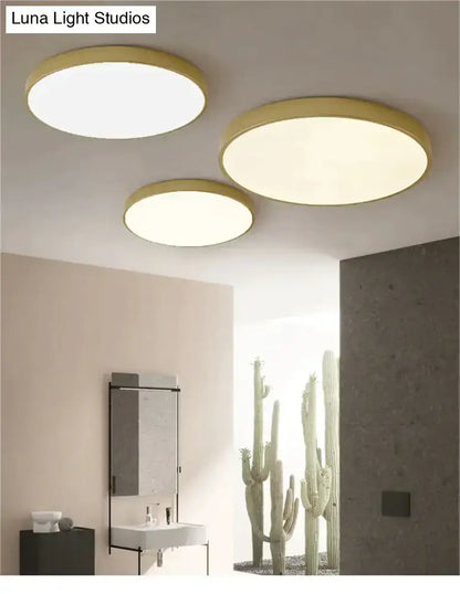 Three decorbites modern ceiling light fixtures with gold frames and warm diffused glow for indoor use