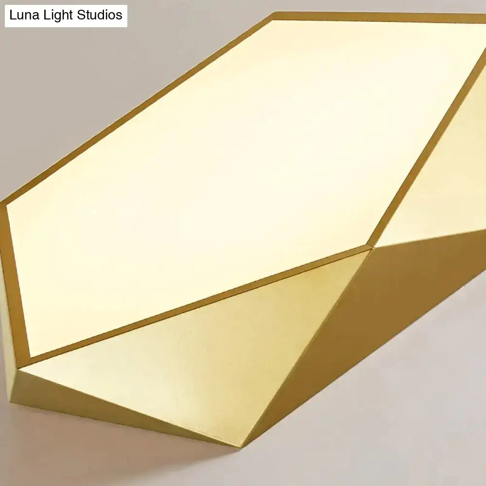 Decorbites modern geometric wall sconce with brushed gold finish and warm diffused lighting for indoor use