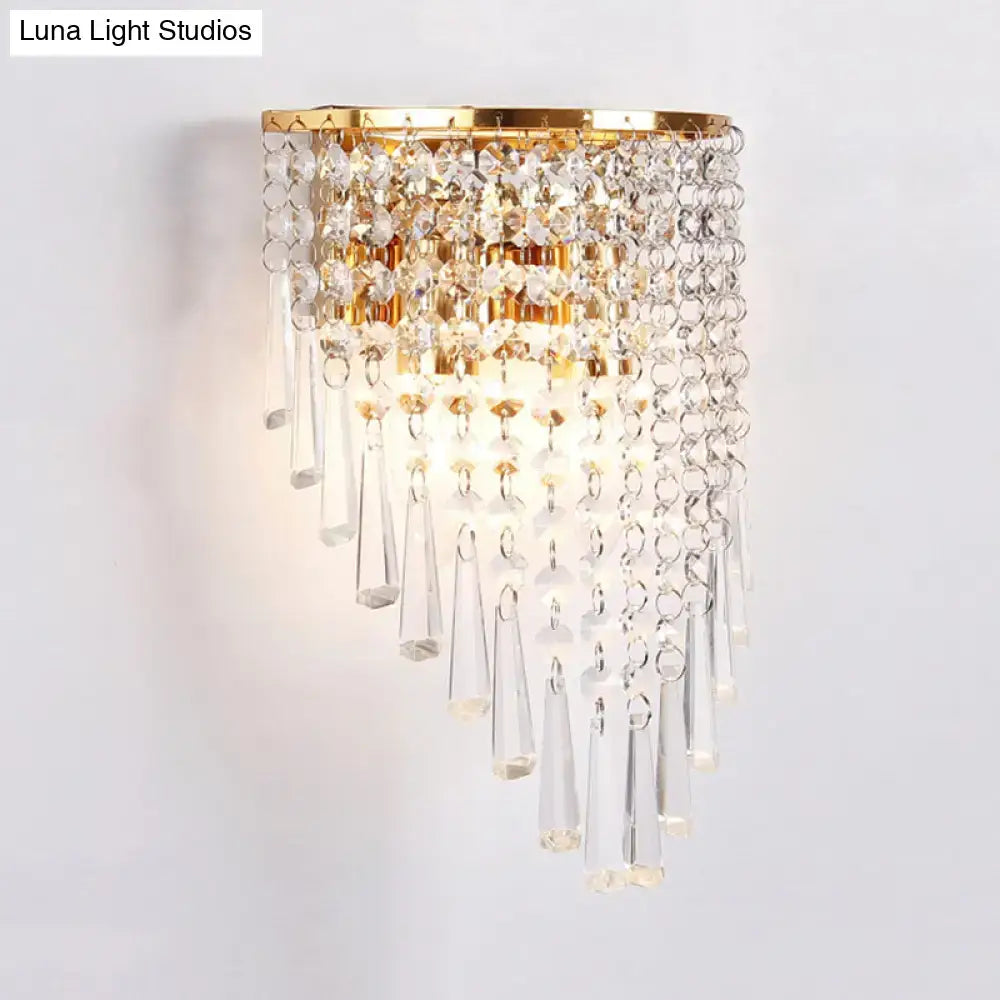 Modern gold finish wall light featuring clear crystal beads and teardrop pendants for bedroom sconce lighting