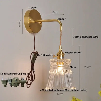 Modern gold fluted clear glass LED wall light with brass copper-finished wall mount and adjustable wire by decorbites clear glass