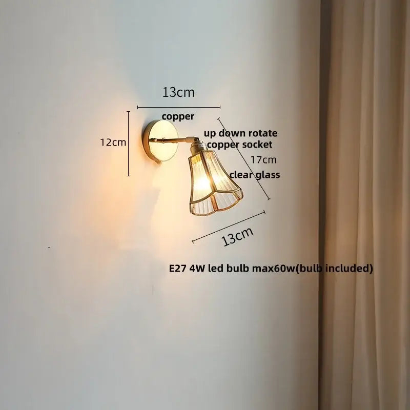 Copper-finished wall sconce with clear glass shade and adjustable rotation for modern gold fluted decorbites led wall use