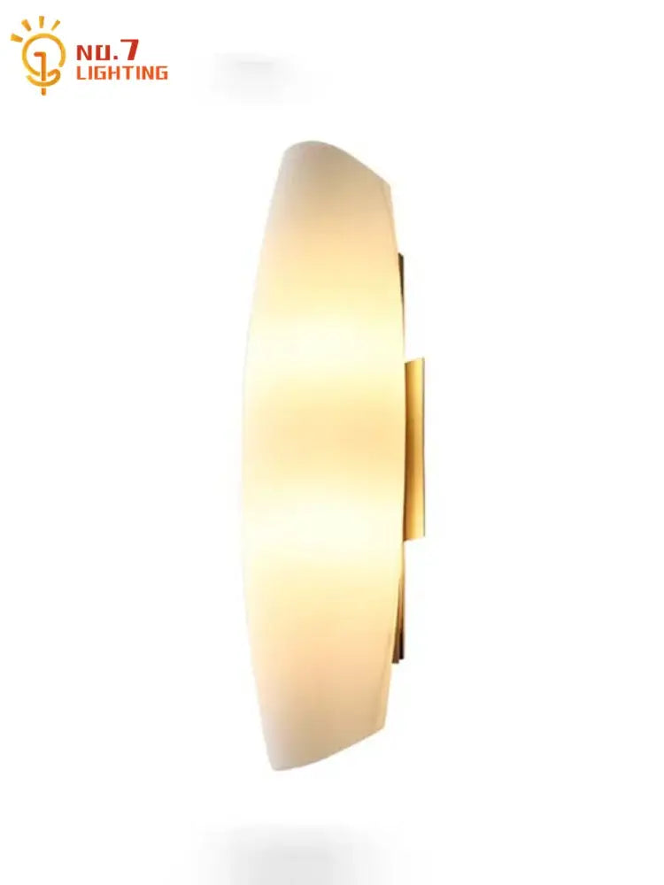 Modern gold frosted glass led wall lamp with gold finish and diffuser ideal as a bedroom led wall lamp