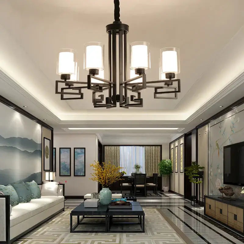 Black wrought iron living room chandelier with six frosted glass shades for luxury living room lighting