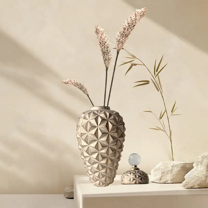 Beige geometric diamond ceramic vase with textured faceted design for modern gold geometric diamond decorbites living room decor