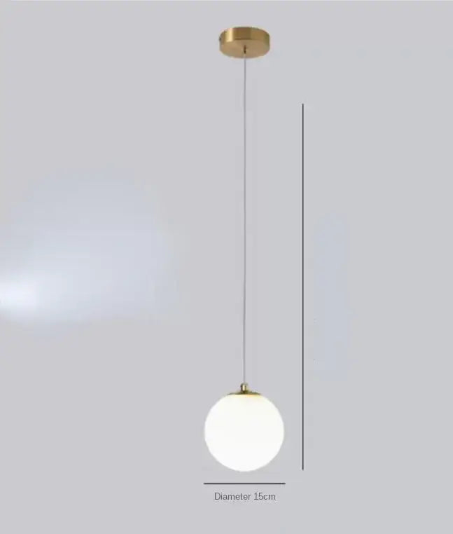 Modern gold glass ball dual head pendant light with brass finish and frosted glass globe for bedroom decorbites decor