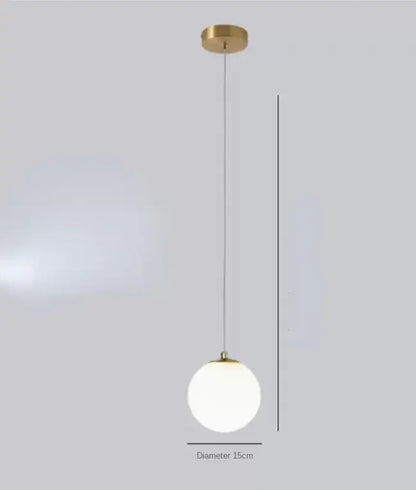 Modern gold glass ball dual head pendant light with brass finish and frosted glass globe for bedroom decorbites decor