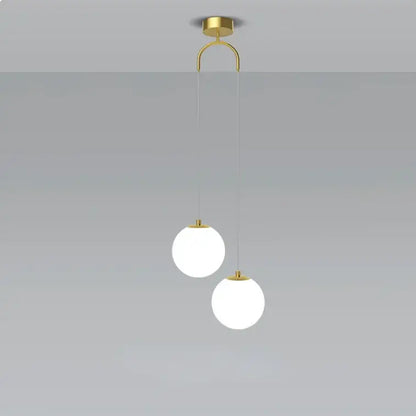Modern gold-toned glass ball dual head pendant light with frosted glass shades for bedroom decorbites pendant light