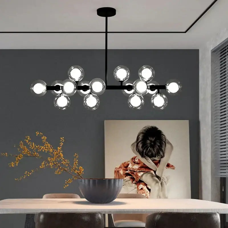 Modern black metal chandelier with multiple clear glass globe bulbs ideal for dining room decorbites glass ball led lighting
