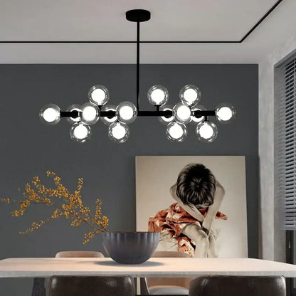 Modern black metal chandelier with multiple clear glass globe bulbs ideal for dining room decorbites glass ball led lighting