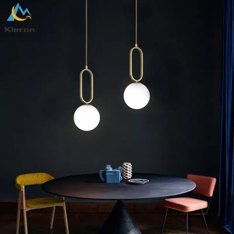 Two modern pendant lights with gold metal frames and frosted glass shades for living room decorbites glass ball led chandelier